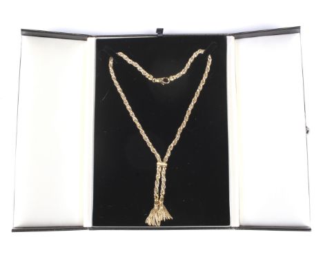 A vintage Italian bi-colour gold rope-twist tassel necklace. In the form of yellow rope-twist links entwined with white box l