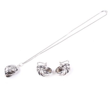 A pair of Italian '750' polished and satinised hollow-spiral earrings, and a pendant and chain, The earrings with clip and po
