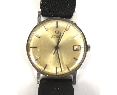 A vintage gentleman's Omega automatic wristwatch. The champagne dial with raised silvered batons denoting hours, date apertur