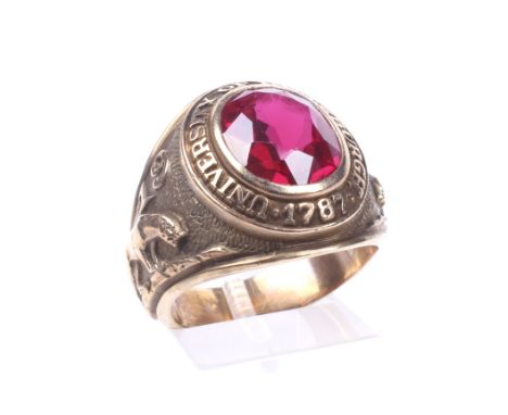 A vintage American synthetic ruby 'college' or class ring. 'University of Pittsburgh 1787' surrounding the central oval mixed