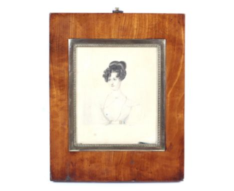 A Victorian portrait miniature of a lady. Circa 1830, pencil, watercolour and gilding, signed LSG Pinxt lower right, within a