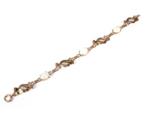 A far Eastern opal and bi-colour bracelet. In the form of three white opal cabochons each displaying a mostly green play of c
