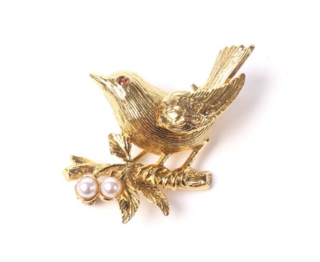 A vintage 9ct gold, garnet and cultured-pearl bird brooch. The Wren(?) with a small garnet eye and modelled perched on a natu