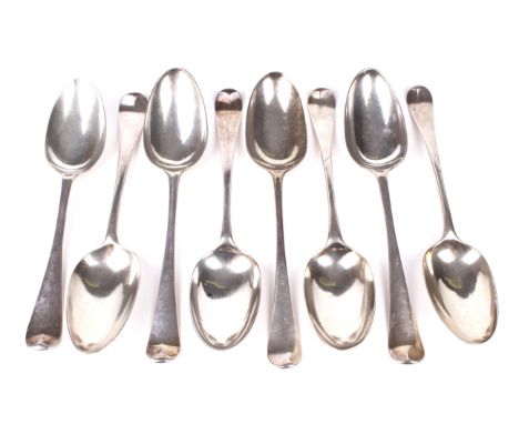 Seven Georgian silver serving spoons. Variously engraved with initials, all assayed in London, with Various date codes and ma