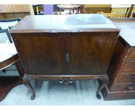 A Queen Anne style mahogany cocktail cabinet 