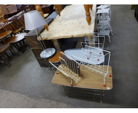 A 1960's standard lamp, two coffee tables, three magazine racks and a tripod occasional table 