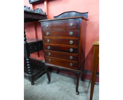 An Edward VII mahogany music cabinet 