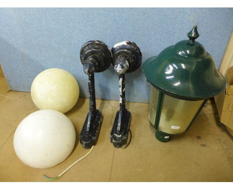 Two vintage outdoor wall lights and a painted copper lamppost top 