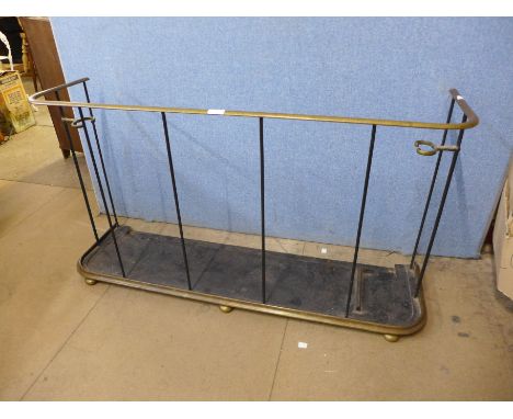 A Georgian brass and iron fireguard 