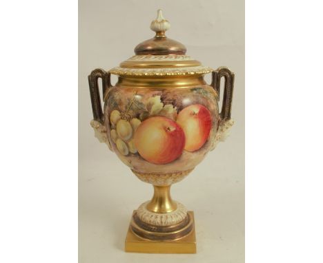 A Royal Worcester covered vase on a pedestal, decorated with hand painted fruit all around by Higgins, shape number 2363, hei