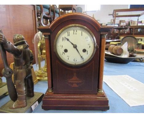 An Edwardian mahogany cased mantle clock, with white dial