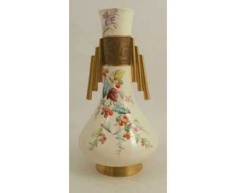 A 19th century Royal Worcester vase, decorated flowers, berries and leaves in the Japanesque style, with gilt handles, height