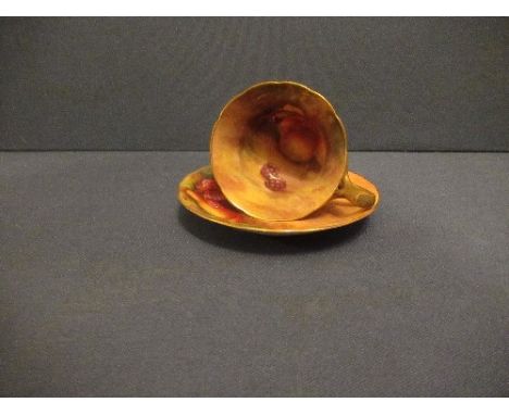 A Royal Worcester cabinet cup and saucer, decorated with hand painted fruit by Townsend and MoselyCondition Report:  Small sc