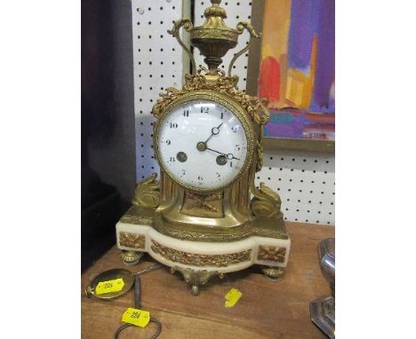 A 19th century French gilt and marble mantle clock, with urn finial , twin trail movement, with key and pendulum&nbsp;