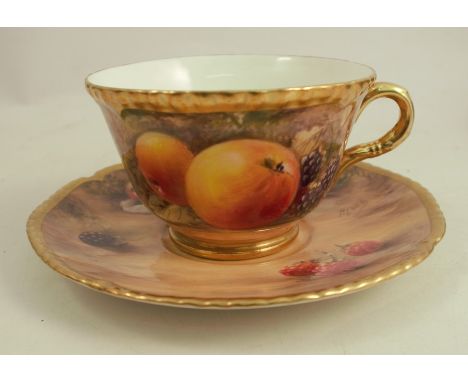 A Royal Worcester cup and saucer, decorated with hand painted fruit by Love, circa 1959Condition Report:  Scratch to the reve