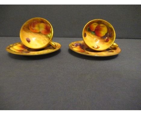 Two miniature Royal Worcester tea cups and saucers, decorated with hand painted fruit by HaleCondition Report:  One saucer is