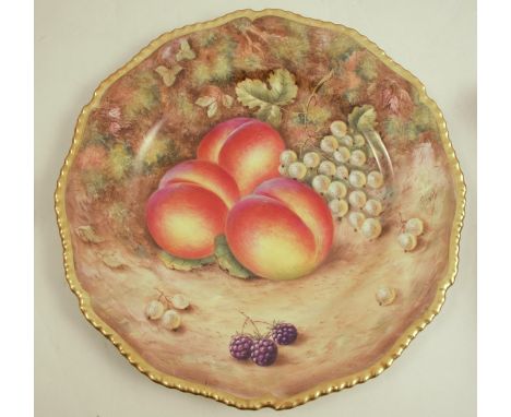 A Royal Worcester plate, decorated with hand painted fruit by Love, to a gadrooned border, diameter 10.5insCondition Report: 