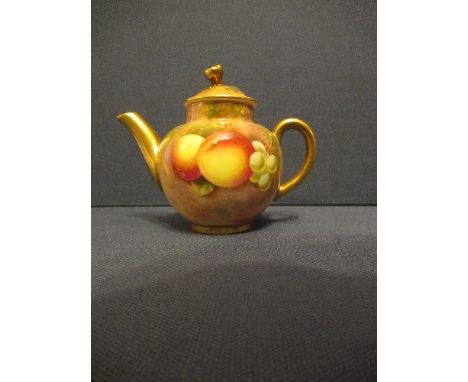A Royal Worcester miniature tea pot, decorated with hand painted fruit by Roberts, height 3.25insCondition Report:  Good cond