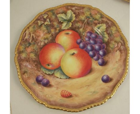 A Royal Worcester plate, decorated with hand painted fruit by Love, to a gadrooned border, diameter 10.5insCondition Report: 