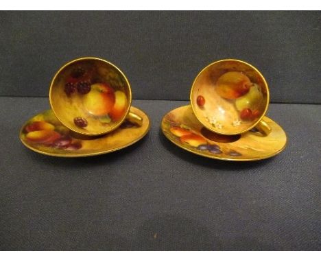 Two Royal Worcester miniature tea cups and saucers, decorated with hand painted fruit, by Ayrton, Rushton and RickettsConditi