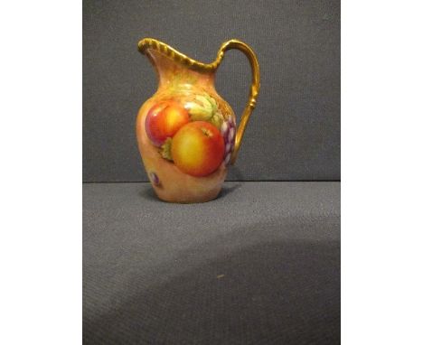 A Royal Worcester milk jug, decorated with hand painted fruit by Leaman, height 4insCondition Report:  Good condition