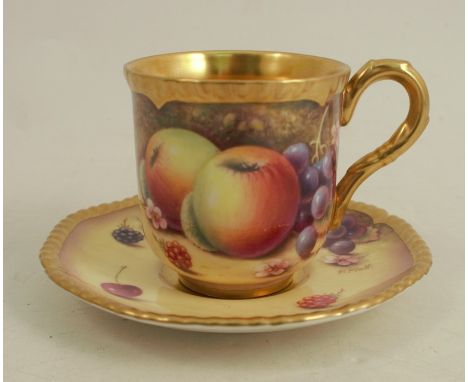 A Royal Worcester coffee cup and saucer, decorated with hand painted fruit by P PlattCondition Report:  Good condition