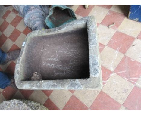 A stone garden trough