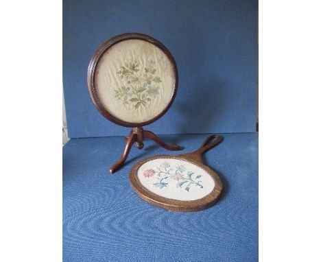 A miniature mahogany tripod table, with floral silk top, together with a silk back hand mirror, height 7.75ins