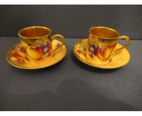 Two Royal Worcester coffee cans and saucers, decorated with hand painted fruit by RobertsCondition Report:  Both in good cond