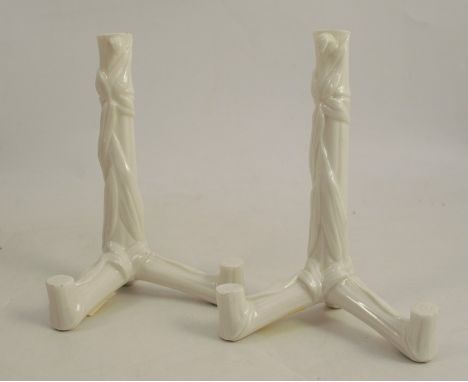 A pair of 19th century Royal Worcester plate stands, height 6insCondition Report:  Minor chips to the top of both