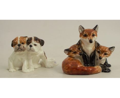 A Royal Worcester model, of three fox cubs, shape 3131, heights 2.25ins, together with a Royal Worcester model of two boxer p