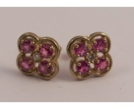 A pair of 9 carat gold ruby and diamond ear studs, 2.1g gross