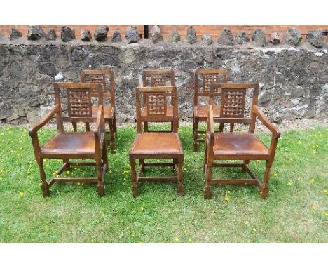 A set of six (4 +2) dining chairs, by Eagleman, apprentice to 'Mouseman', with lattice back and eagle stamp to the legsCondit