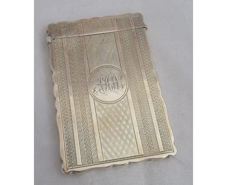 A silver card case, of shaped rectangular form, engine turned decoration and engraved with initial, Chester 1903, weight 1oz