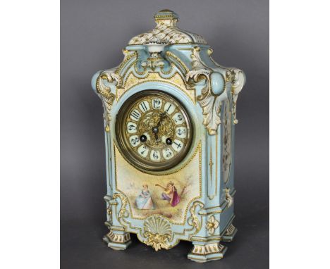 A late 19th/early 20th Century French blue glazed and gilded pottery case mantle clock, the movement by Marti, with 9cm diame