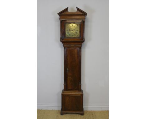 A late 18th Century oak and mahogany banded  longcase clock by Samuel Burton of Hawkshead, the 28cm brass dial with calendar 