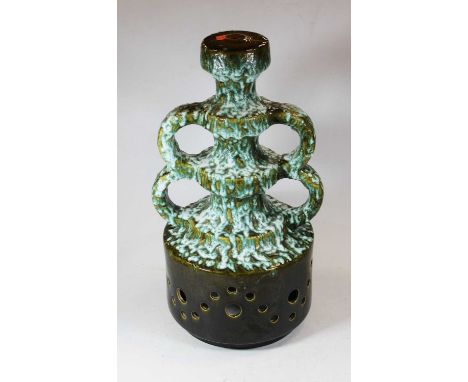 A 1970s West German green glazed pottery lamp base, having four loop handles to a pierced circular base, h.50cm