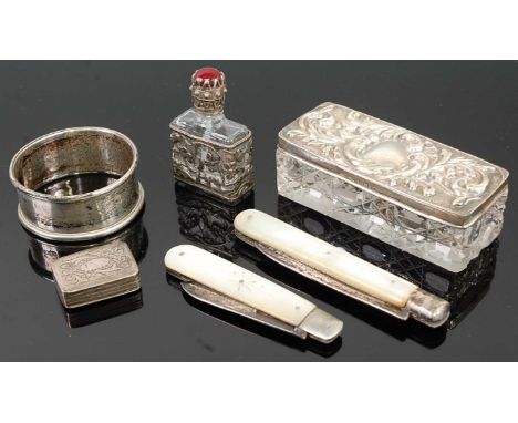 Two silver and mother of pearl pocket fruit knives; together with a circa 1830 silver vinaigrette; a cut glass and silver top