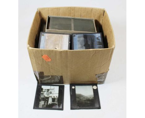 A collection of assorted magic lantern slides to include boxed Paget Plates slow lantern slides, French examples, etc