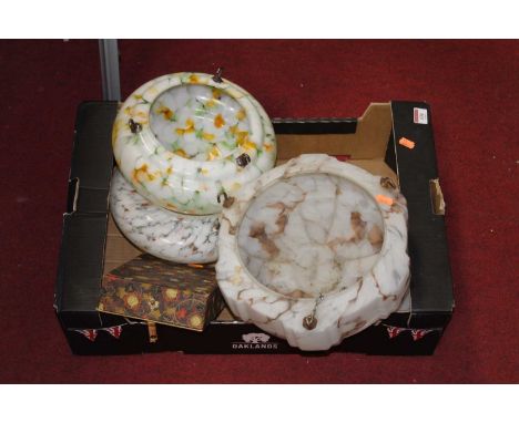 A box containing four 1930's ceiling light shadesCondition report: Brown/white – cracked.Orange/white – OK.Yellow/green/white
