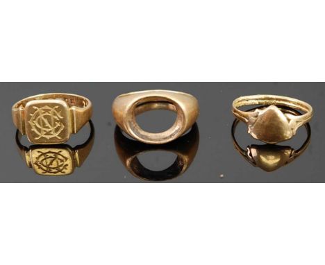 An 18ct gold gent's signet ring, size L; and one other unmarked yellow metal example lacking stone, tests as 18ct, gross weig