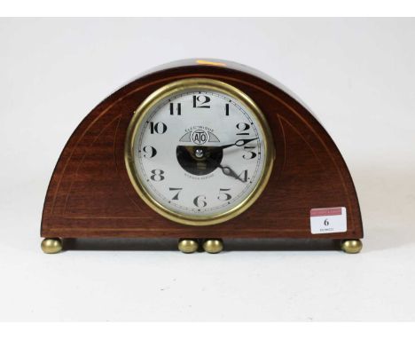 An early 20th century French mahogany and boxwood strung cased Electrique mantel clock, the convex silvered dial with Arabic 