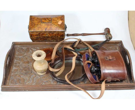 A 19th century simulated rosewood tea caddy, of sarcophagus form, having lion ring mask handles; together with a carved oak t