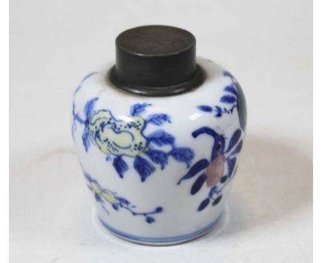 A Chinese export tea caddy of squat baluster form having a pewter cover with further inner cover over body decorated with flo