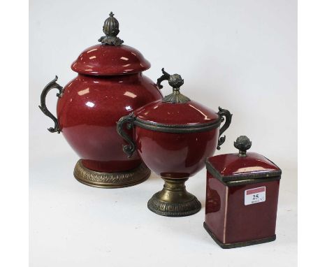 A reproduction ceramic jar and cover, of squat circular form, having acorn finial with twin gilt metal handles, h.31cm; toget