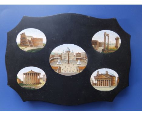 A 19thC Italian black marble micro mosaic paperweight, of serpentine rectangular tablet form, inlaid with five oval architect