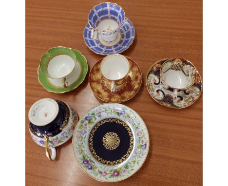 A late Sevres porcelain cup & saucer and four various cups & saucers. (10)