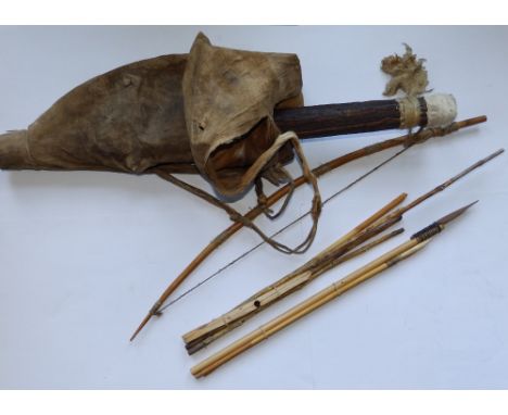 An African bow, quiver and arrows.