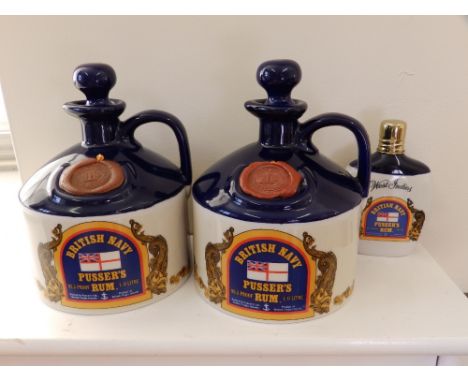 Two British Navy Pusser's Rum jars together with a hip flask. (3)