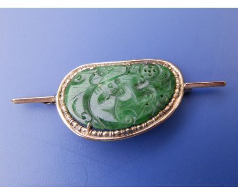 A Chinese jade panel brooch.
